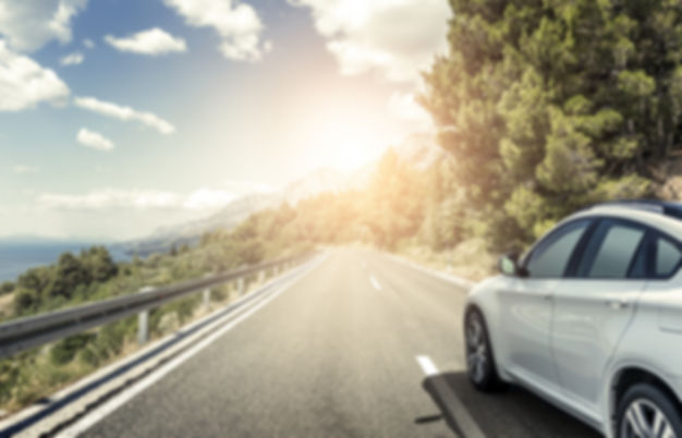 white_car_highway.jpeg