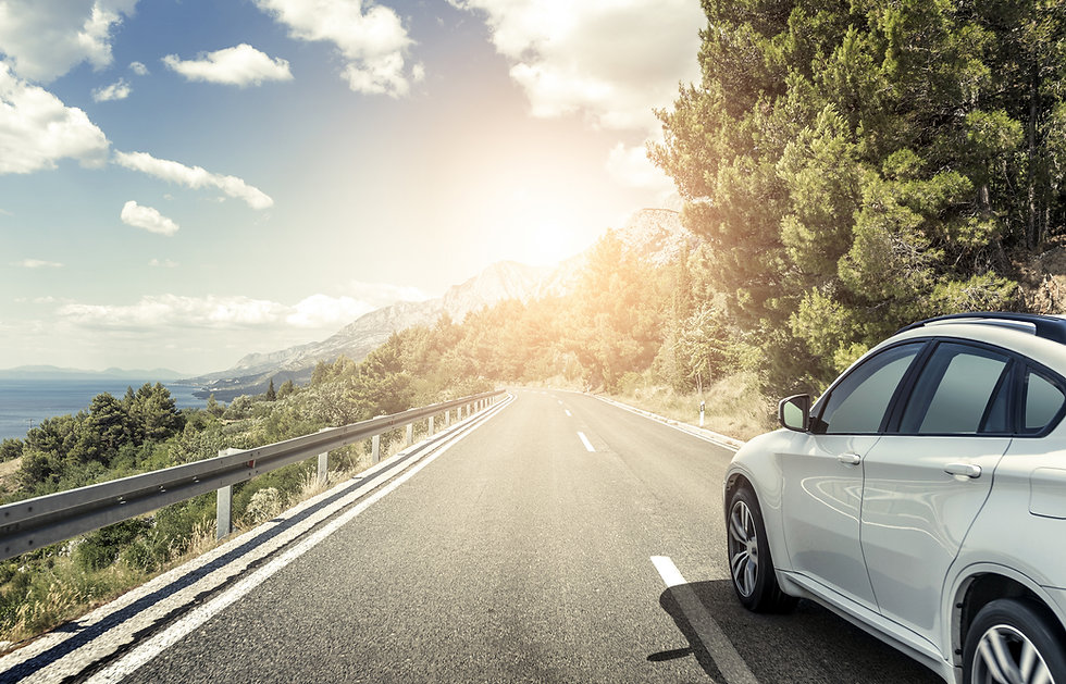 white_car_highway.jpeg