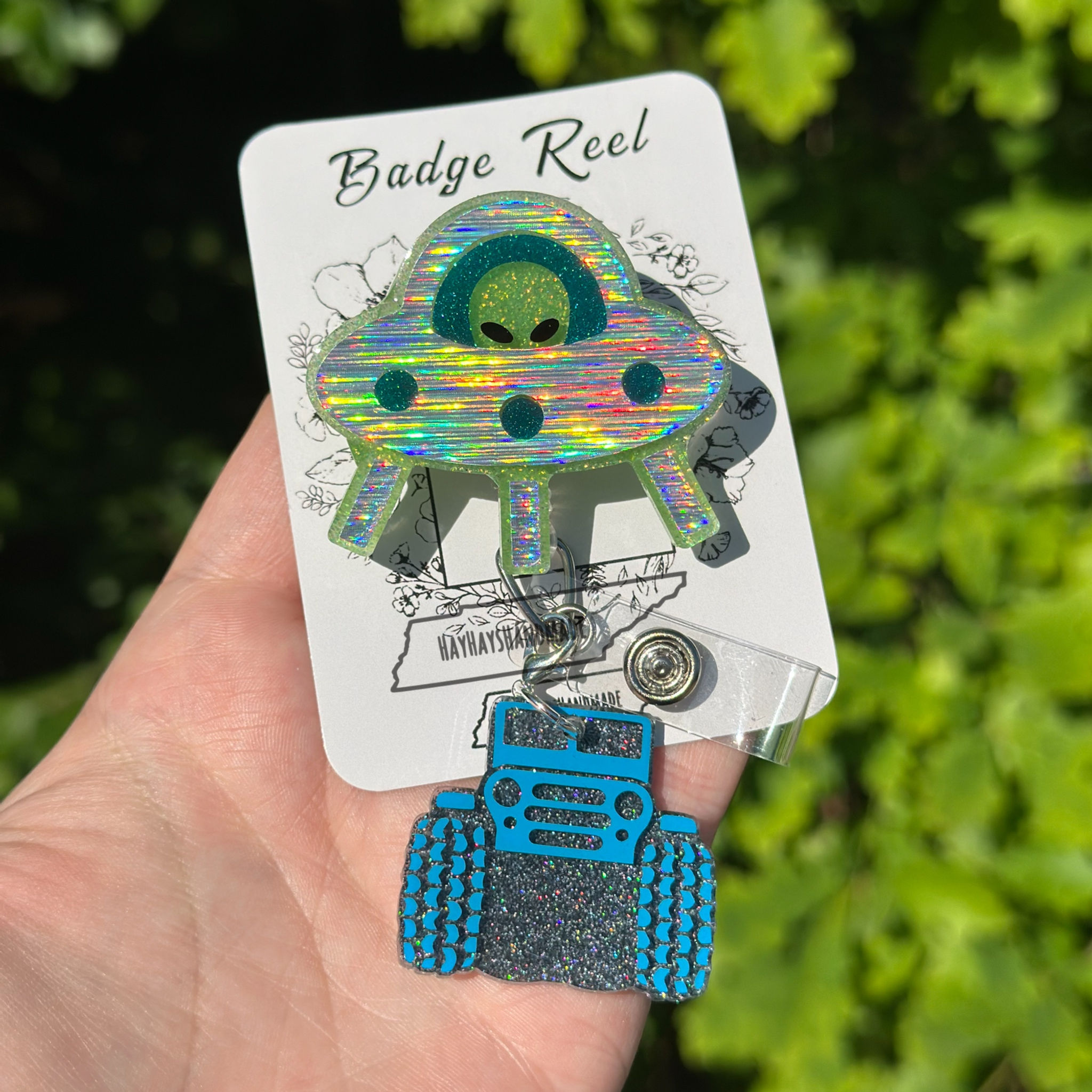 Original Alien Off Roading Vehicle Abduction UFO Badge Reel