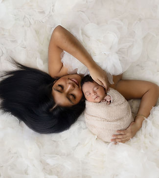 newborn-in-moms-arms-orlando-photography.jpg
