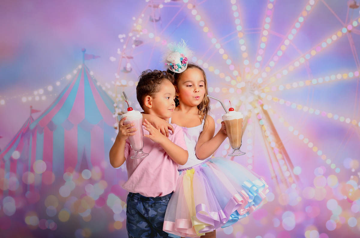 Baby celebrating a pastel fairytale themed cake smash photoshoot with dreamy colors and decorations.