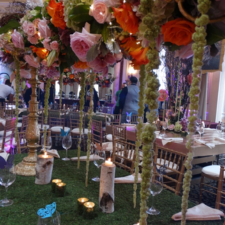 Flower and candle centerpiece for a party