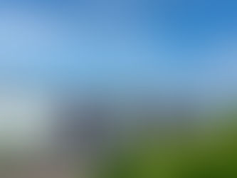 a family group cycling e-bikes on the new forest coast