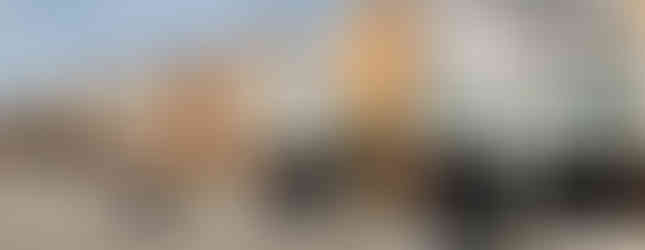 Exterior rendering entrance of a modern multi-family housing project, Maiden Lane Apartments in Wenatchee, WA designed by modFORM LLC.