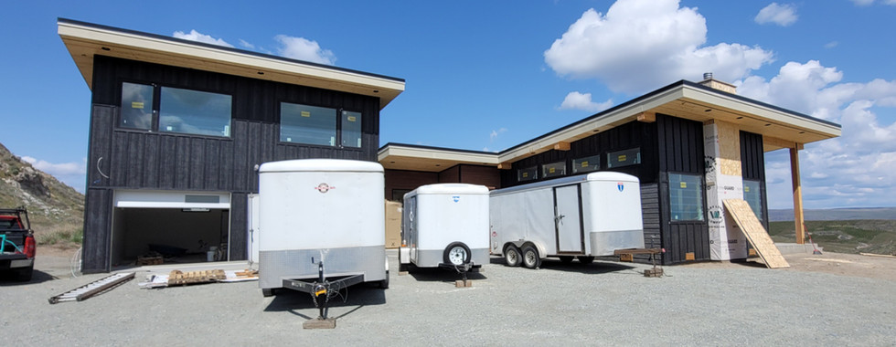 Exterior front view of a mountain modern single-family residence in Brewster, WA by modFORM llc.