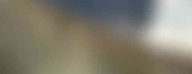 Exterior side view of a modern v-shaped single-family residence in Wenatchee, WA by modFORM LLC.