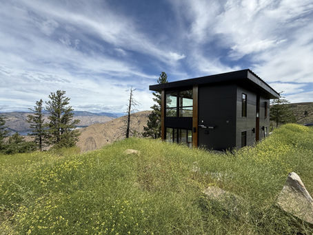 Exterior view of mountain modern Waterville ADU cabin with valley views