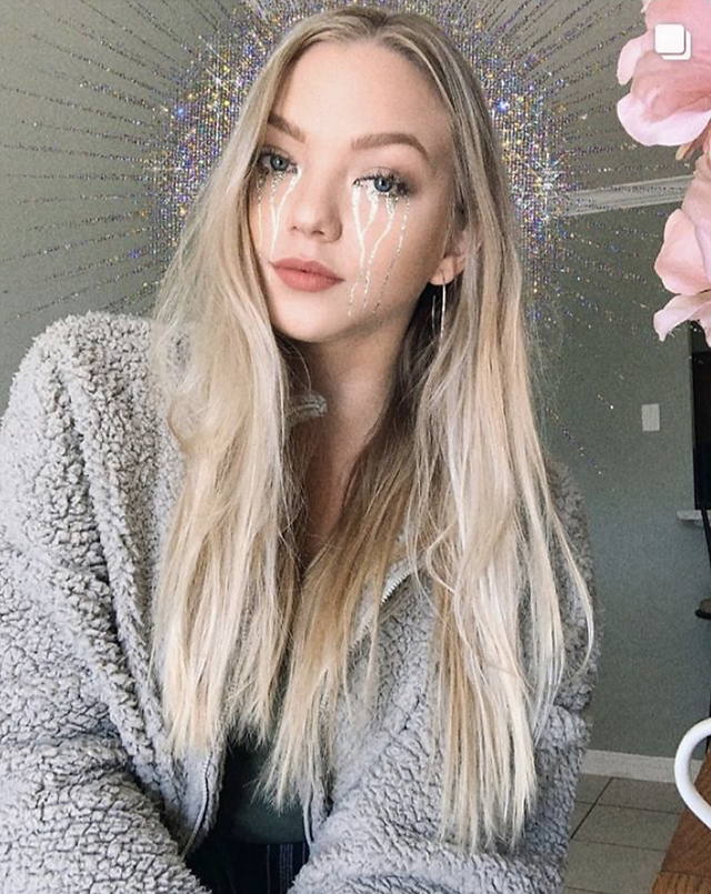 Blonde girl with glitter tears, mental health blogger