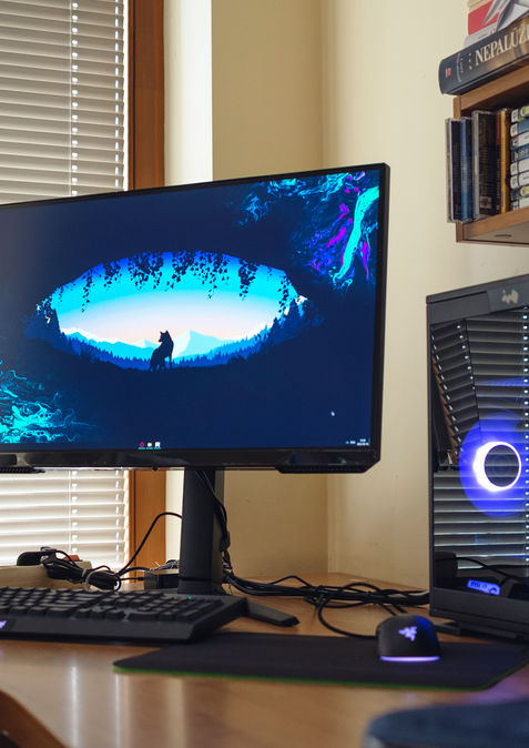 Custom PC setup with monitor, keyboard, and mouse