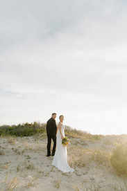 Golden hour photos on the dunes during Corolla NC wedding