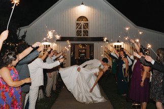 the bride and groom exit