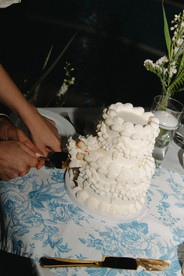 Cake cutting during Outer Banks destination wedding