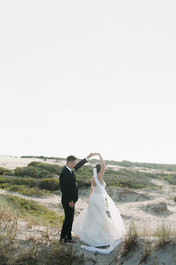 Wild horses roaming the dunes near a wedding venue in Corolla, North Carolina