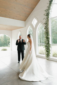 bride first look with father