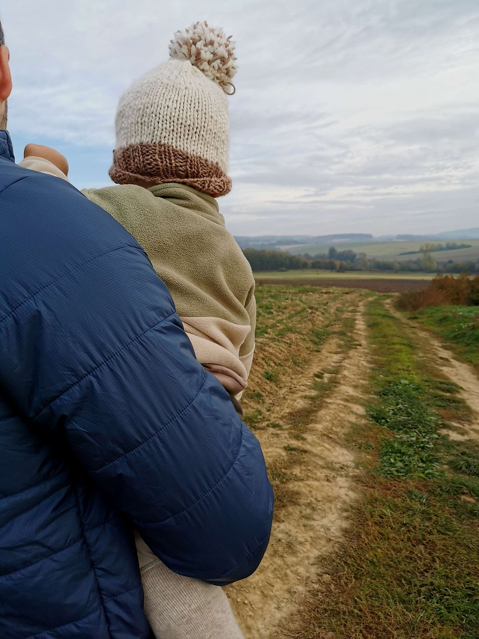 Dad holding a child