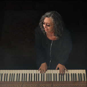 For decades, Lily Sazz has been the unseen force behind countless performances, a keyboardist, vocalist, and musical director whose talent lifted others while her own voice remained in the background.