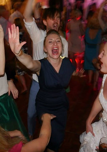 Guests dancing to the DJ at a wedding