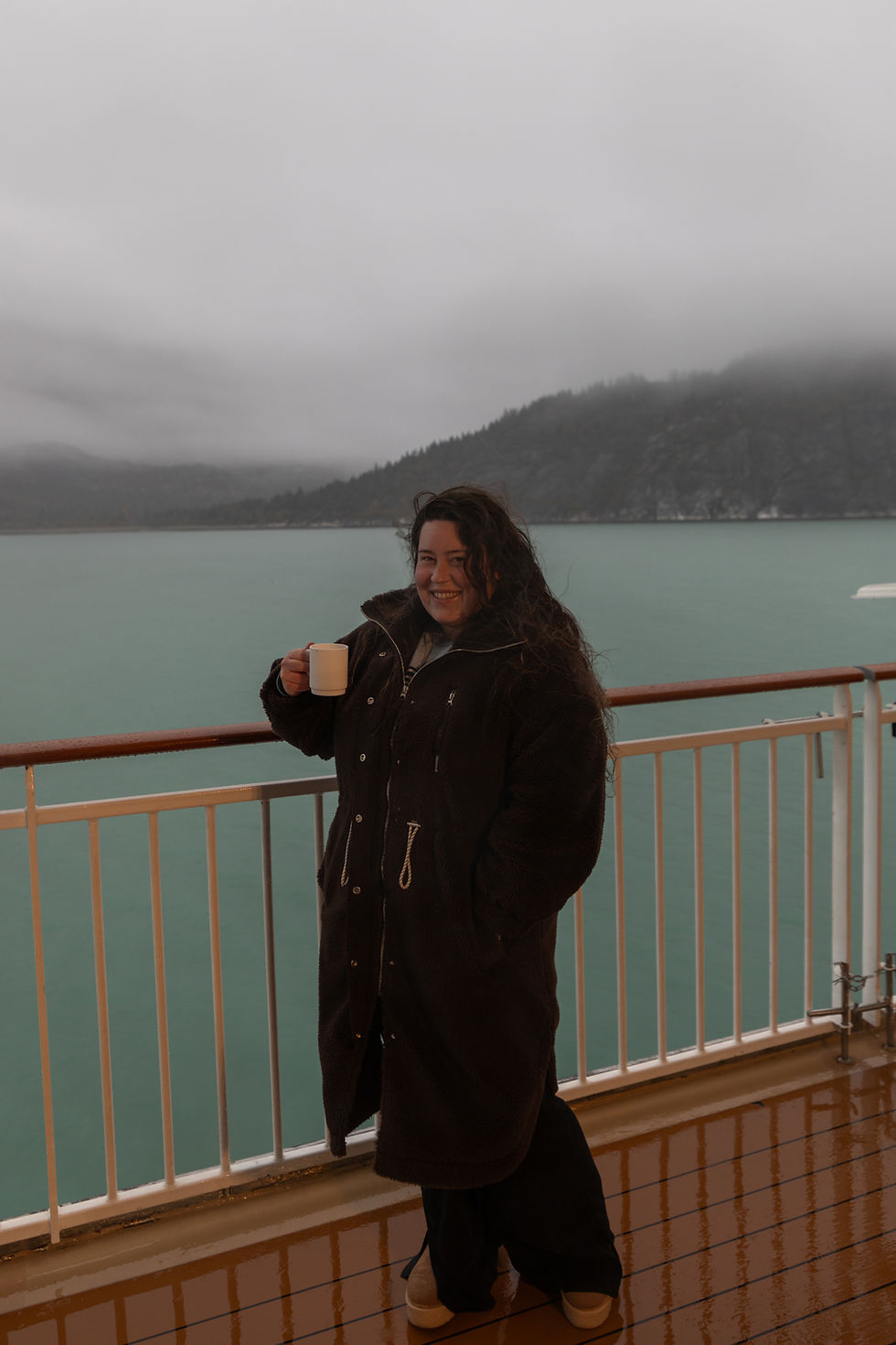 Girl on the side of the Norwegian Encore Cruise