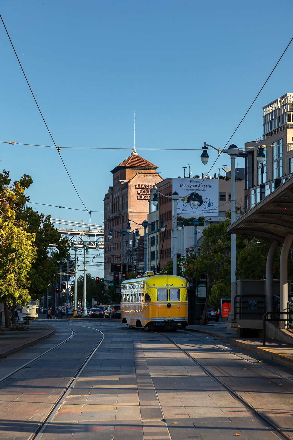 Muni Trolleys in front of the San Francisco Ferry Building