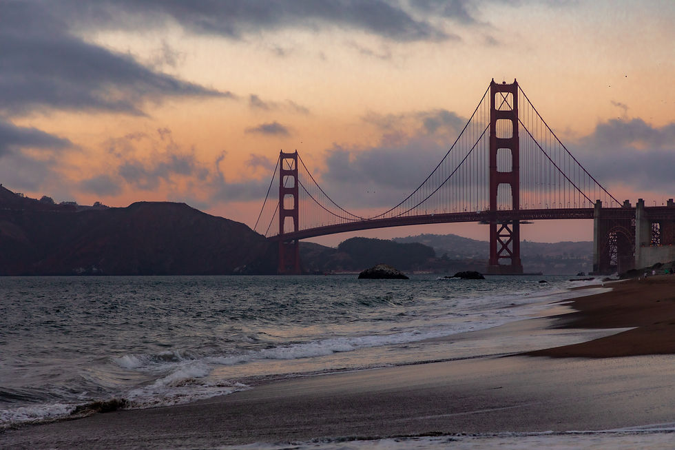 Sunset photo of the Golden Gate Bridge from Baker Beach