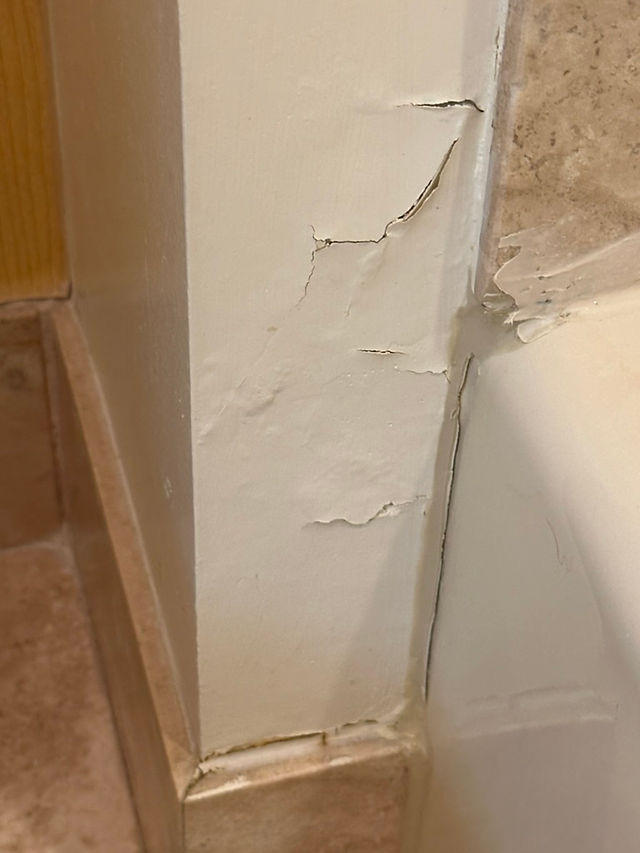 Hole In Corner Of BAthroom