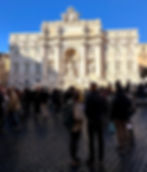 Rome, Italy; A crowd gathers in front of the Trevi Fountain showcasing how easy it is for a pickpocket to steal something from you, there is little room between people as they look at maps and the fountain