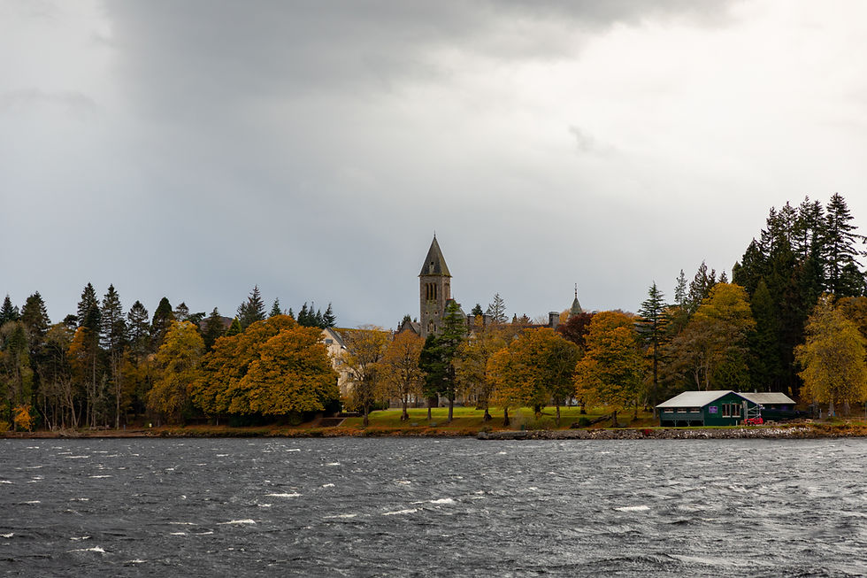 Views from the loch ness fery tour of a home and chapel on the banks
