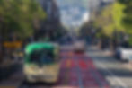A San Francisco Muni streetcar running through downtown