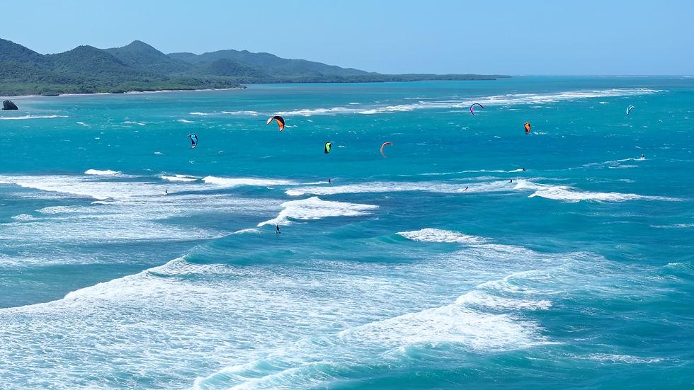 Kitesurfer on a downwinder from Buen Hombre to Playa Popa, Dominican Republic