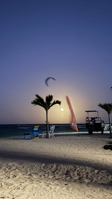 Golden hour kitesurf ride tropical destination