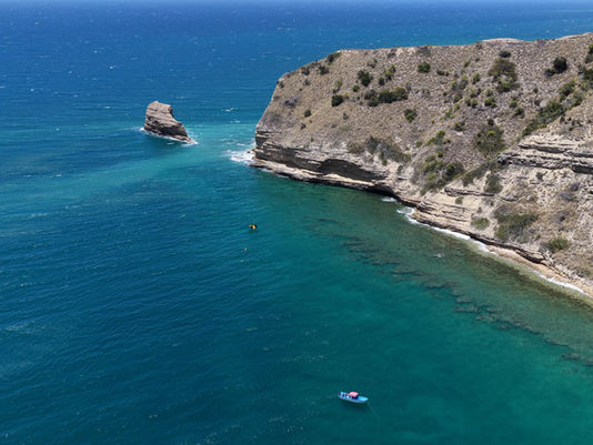Aerial view of El Morro, the flat-topped limestone mountain above Monte Cristi, Dominican Republic