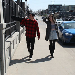 Ember & Oak is a country/folk duo based out of Omaha. Comprised of singers Natalie Christie and Lowgaen Schmidt, this group has been performing across Nebraska since 2021. Their performances have included JunkStock, Vala's Pumpkin Patch, Slattery's Vintage Estates and Winery, The Copper Room, Rich Harvest Winery, District Table & Tap, and most recently at the Nebraska State Fair. Their dynamic, rich harmonies and lush melodies expand cover tunes that range from Kacey Musgraves, Sixpence None the Richer, Taylor Swift, and Thompson Square, to plenty of country, folk, 90's alternative, and original music sprinkled in, including their newest tune titled "Stay With Me."