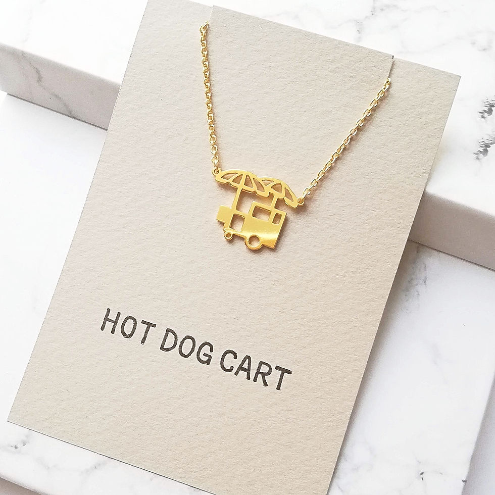 Thumbnail: Gold hot dog cart pendant. Flat cut-out shape has two parasols on the cart.