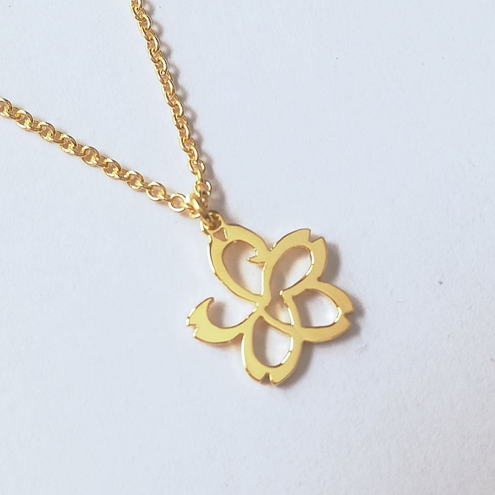 Thumbnail: Gold cherry blossom flower necklace. The shape is designed with Japanese word. The background is white.
