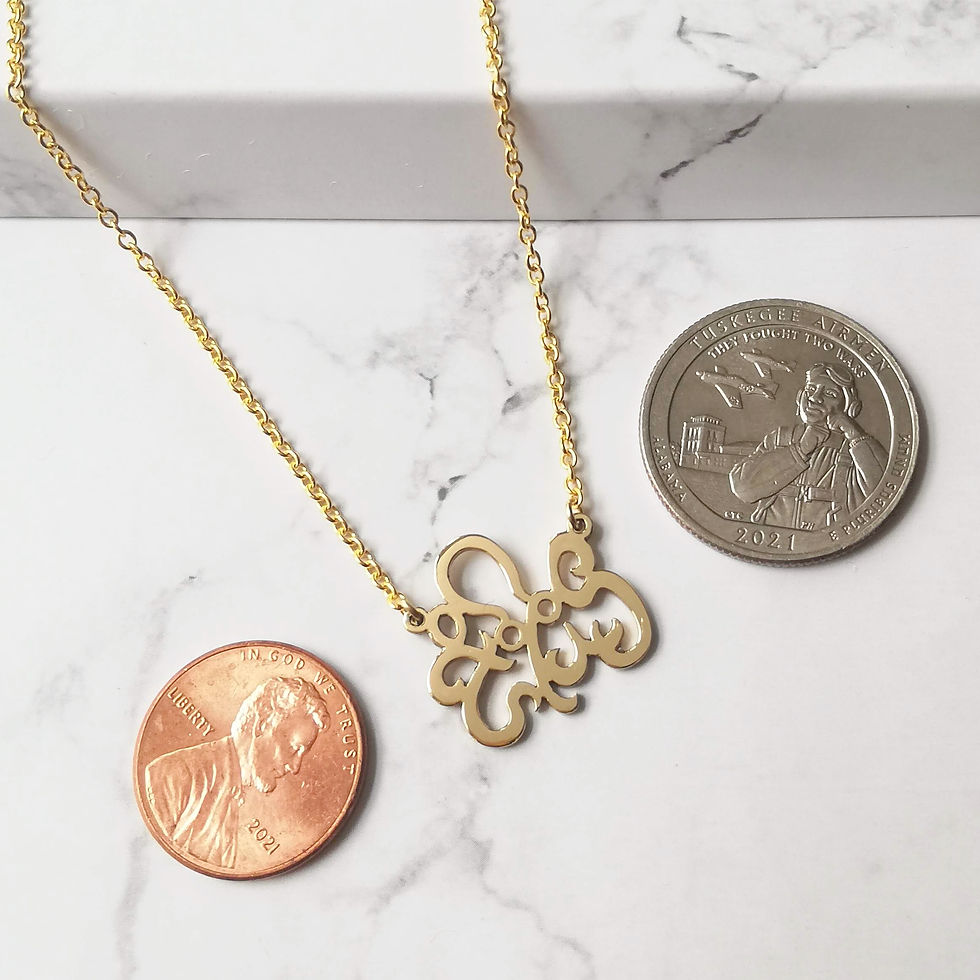 サムネイル： gold flat octopus and US coins are on marble. Legs are curly and head is tilted.