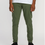 Thumbnail: Man in green pants posing for a picture wearing white shirt.
