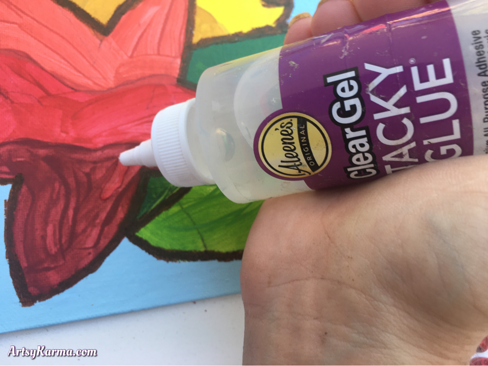Using gel glue to apply buttons on canvas