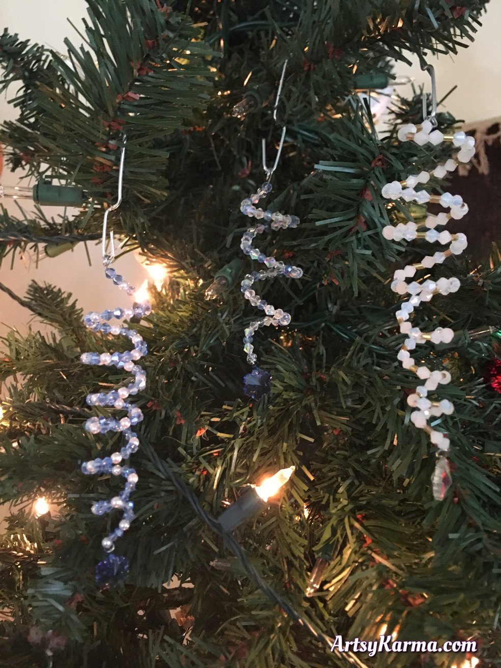 A trio og spiral beaded and crystal ornaments.