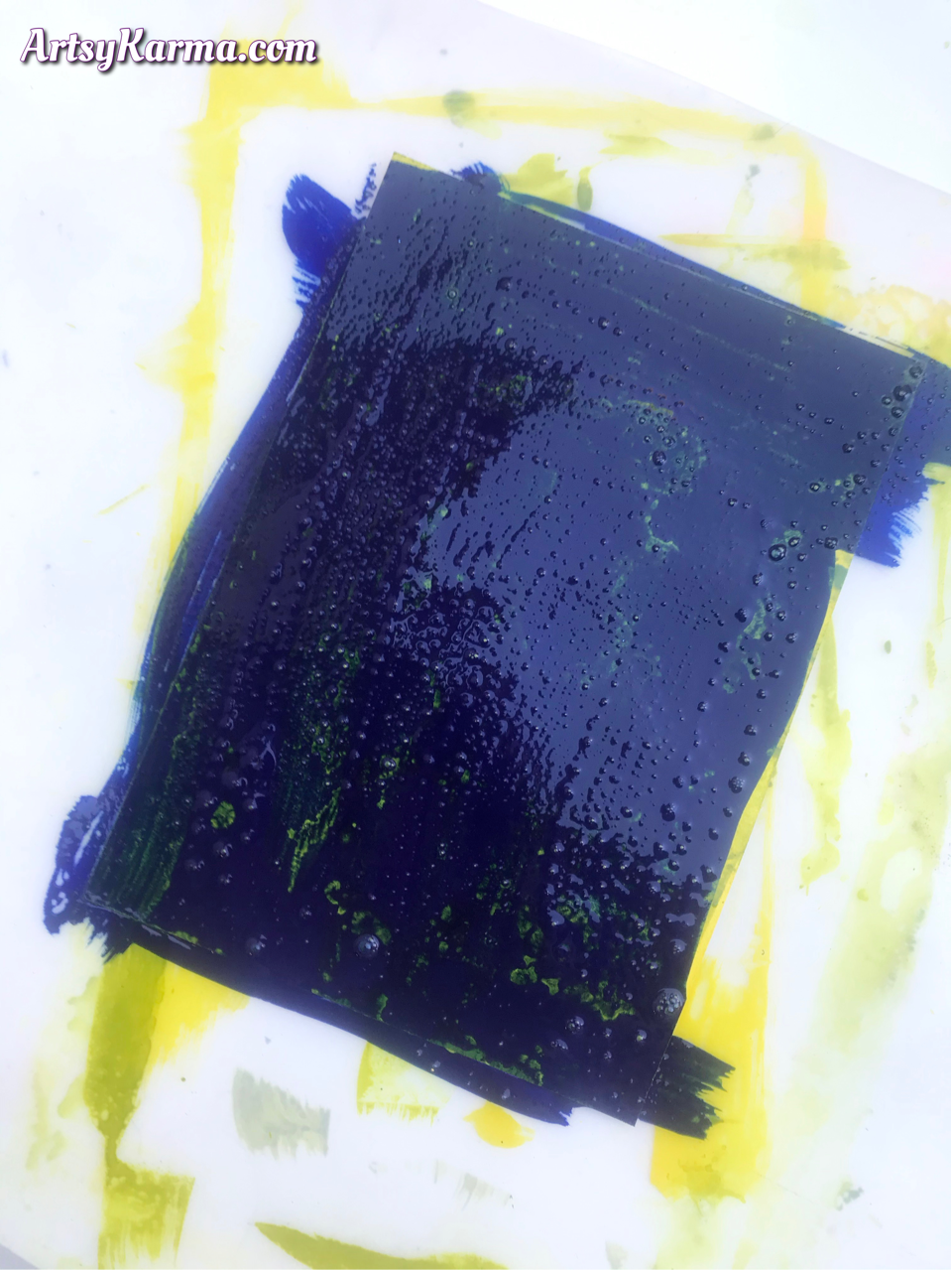Layering acrylic paints and rubbing alcohol