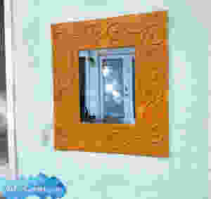 a beautiful faux embossed frame for a dollar store mirror