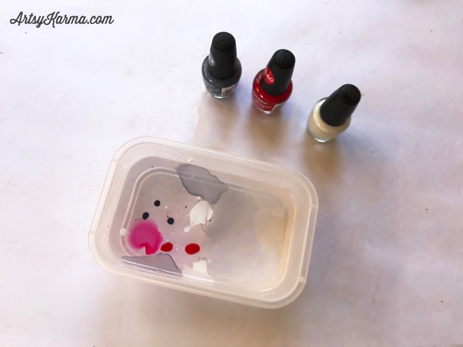 use 3 colors of nail polish to marble