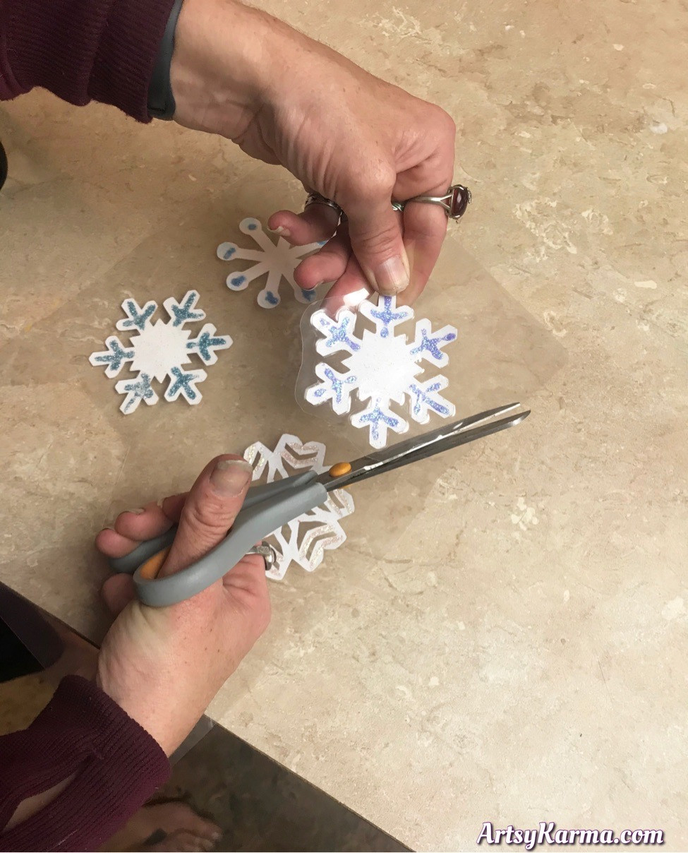 Cut out your laminated diy snowflakes
