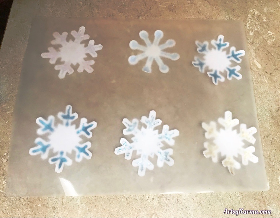 Laminate your homemade snowflakes