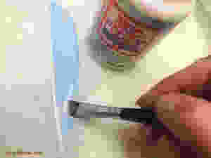 making a feather garland sparkle
