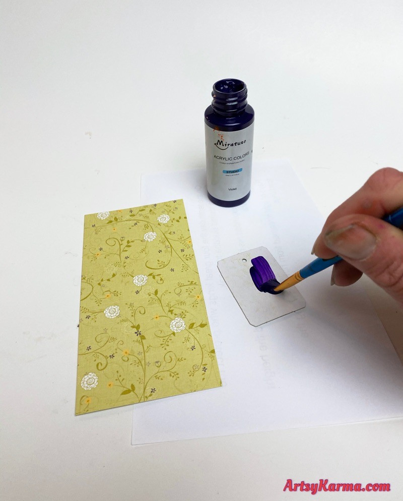 Paint chipboard tags and cover with scrapbook paper