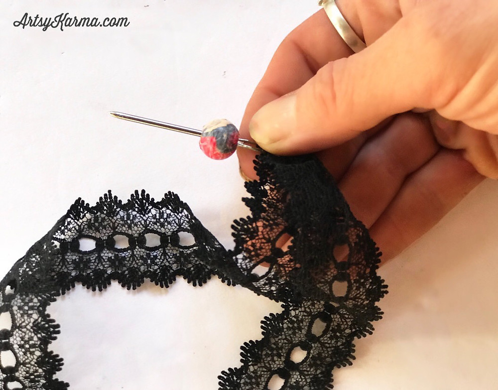 stringing a bead thru lace