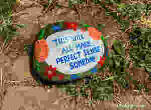 An inspirational painted rock for COVID 19