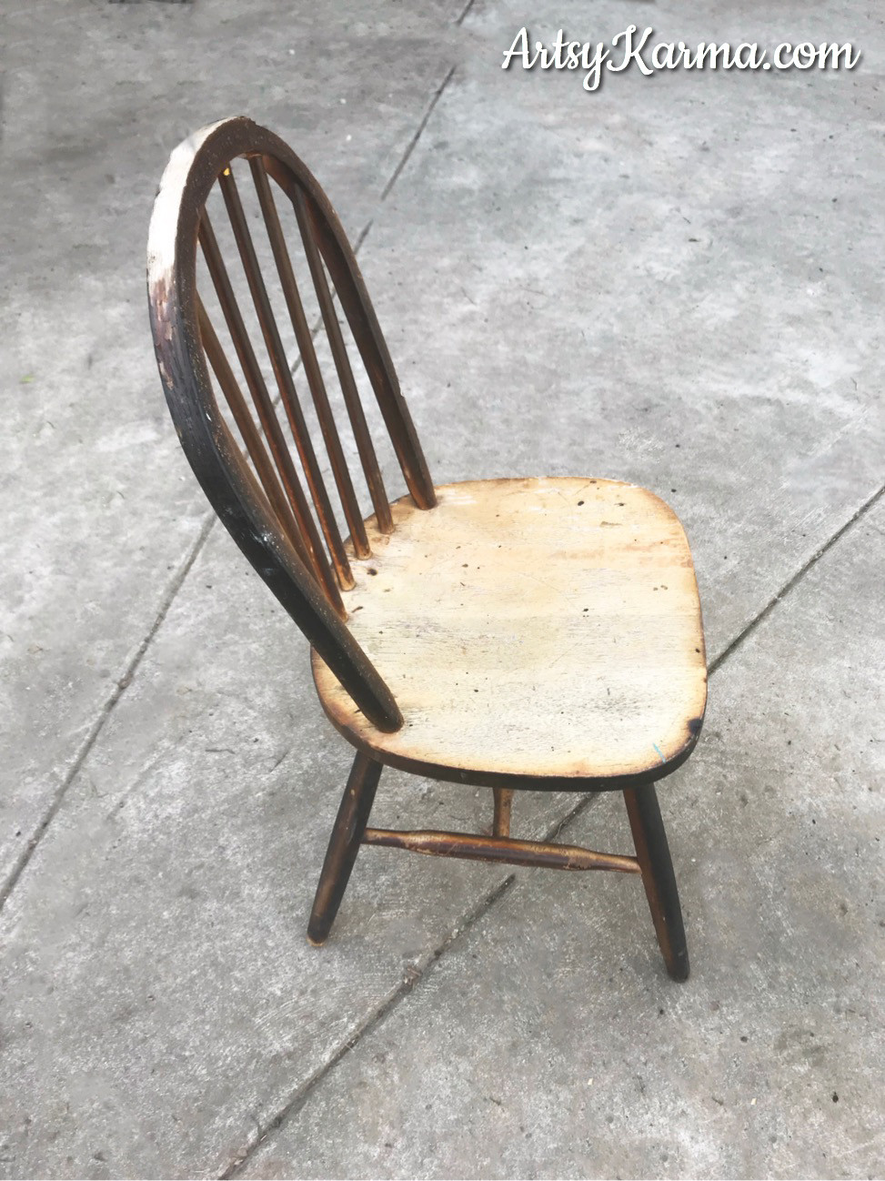 a charred wooden chair