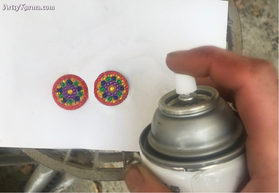 Spray your rhinestone earrings with some time of varnish to keep it nice and protected.