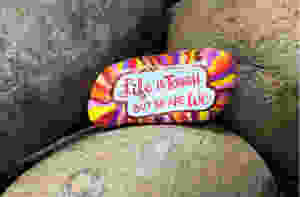 life is tough, but so are we painted rock